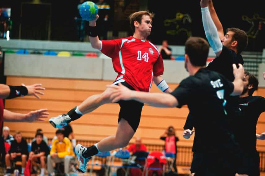 The Player Shooting at the Handball Game